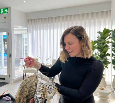 Hair and Beauty - Hairdresser Putting Foils for Highlights on a Client's Head