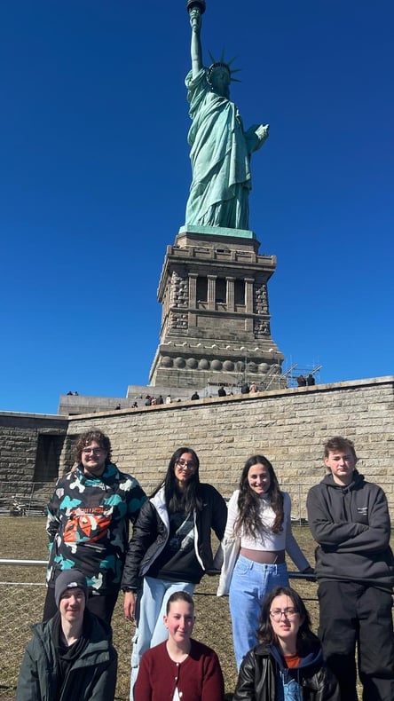 Foundation - Group Photo Under the Statue of Liberty USA
